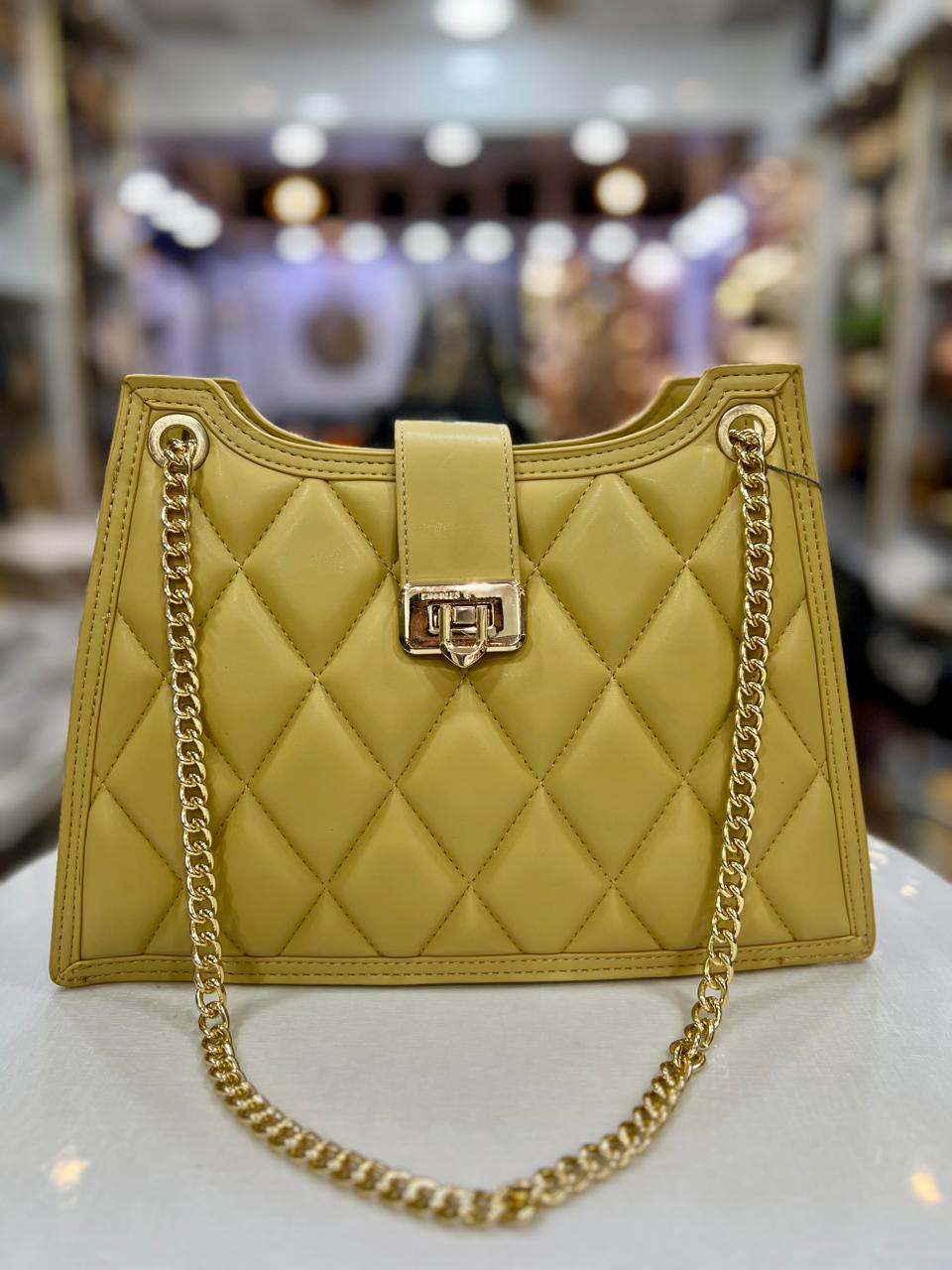 CHARLES & KEITH Cressida Quilted Trapeze Chain Bag